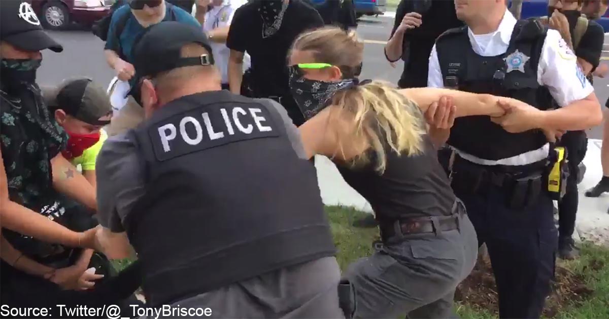 chicago-pd-antifa-arrest-video-tug-of-war